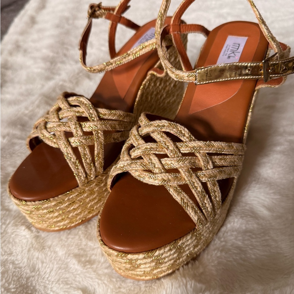 Brand new cream and gold platform espadrille wedges. 5” platform with 2” lift.